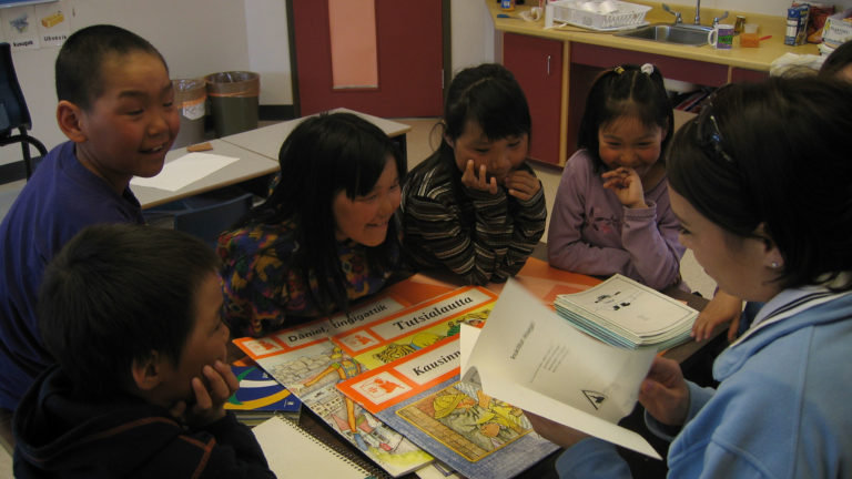 Inuit pupils and teacher in classroom